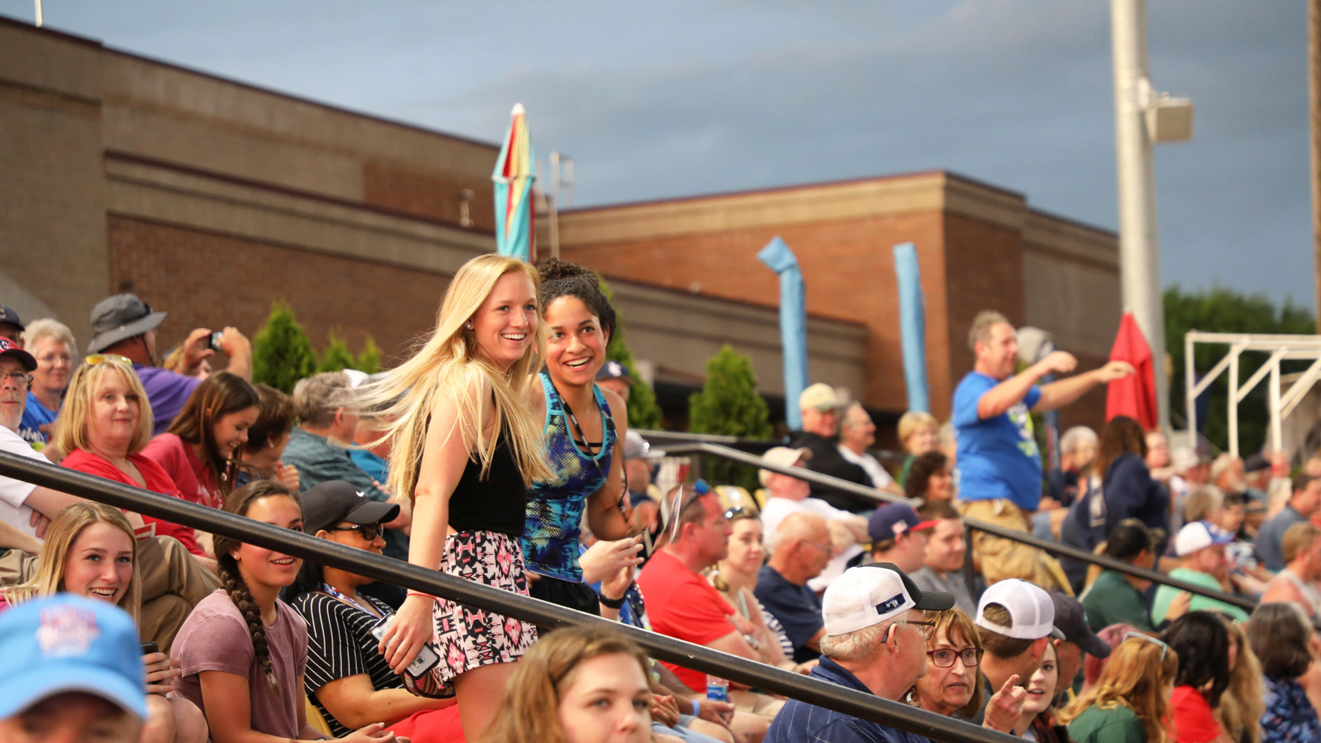 Fans in the stands dancing